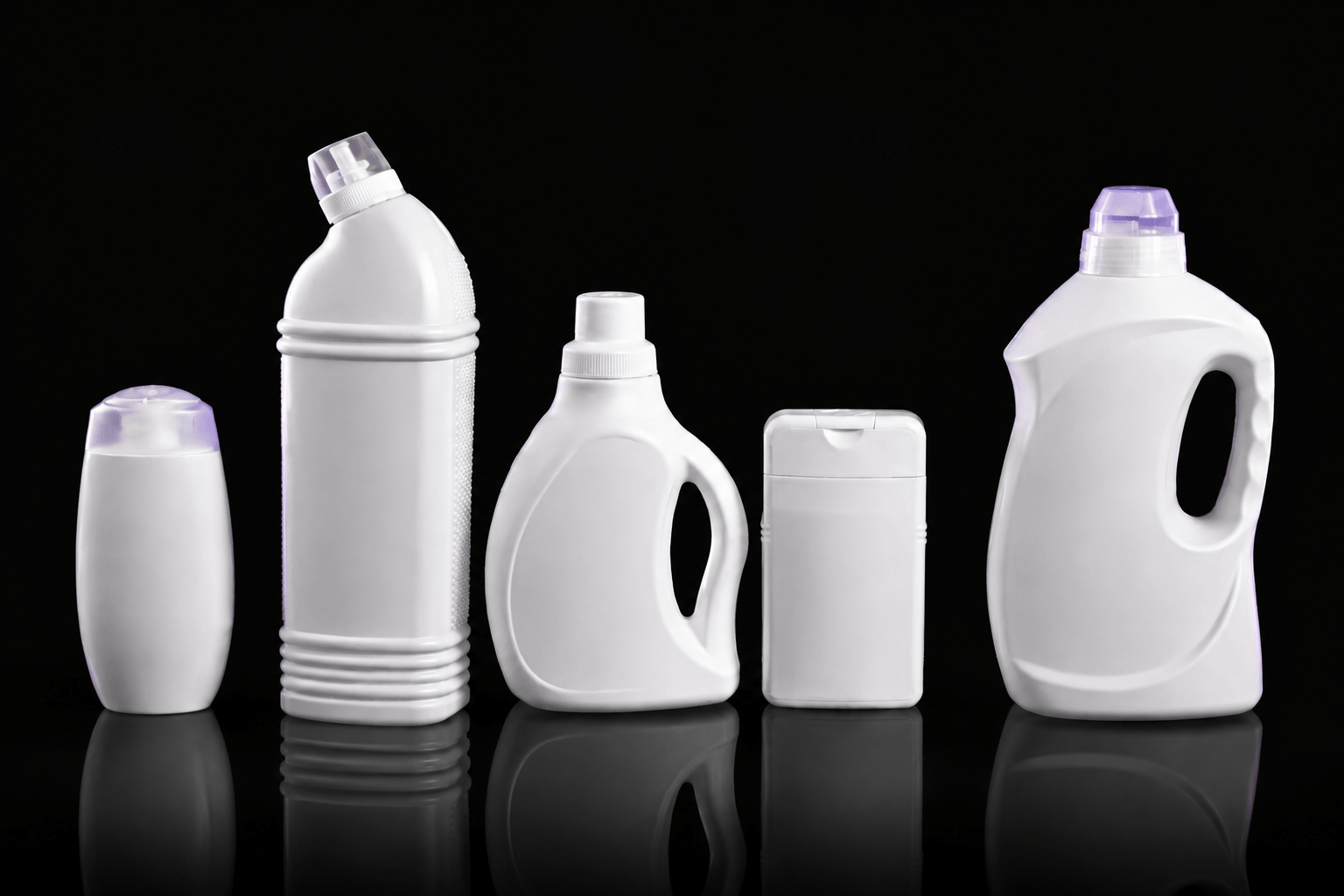 White plastic household cleaning spray bottle and pump dispenser on dark marble surface | Aorui Pack
