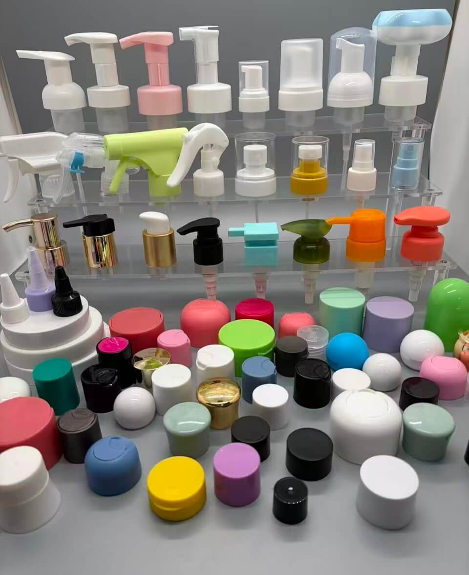 Plastic bottle caps, pumps and sprayer closures in various colors and styles
