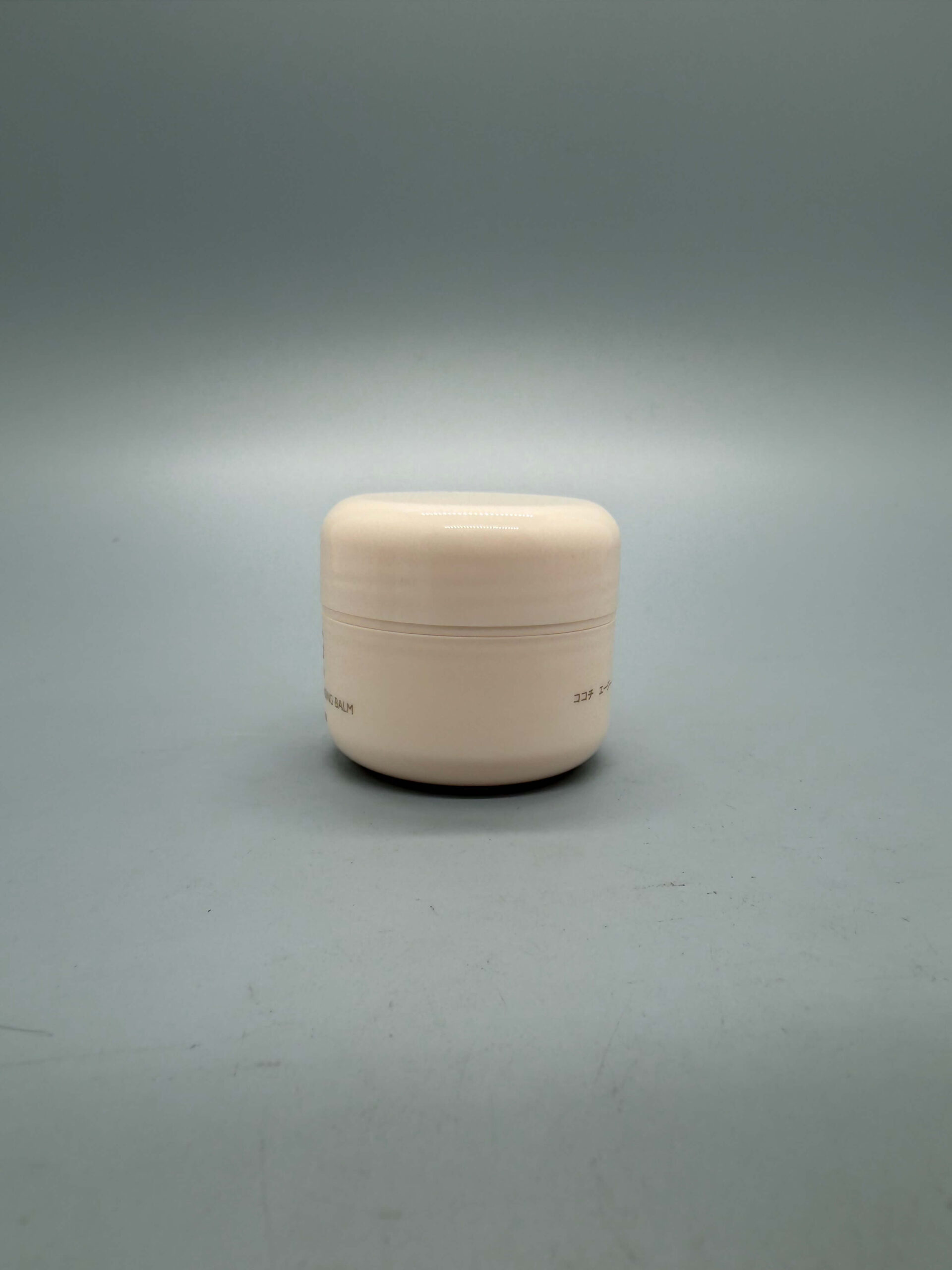 Round cosmetic sample jar in gold-bronze finish - Aorui Pack